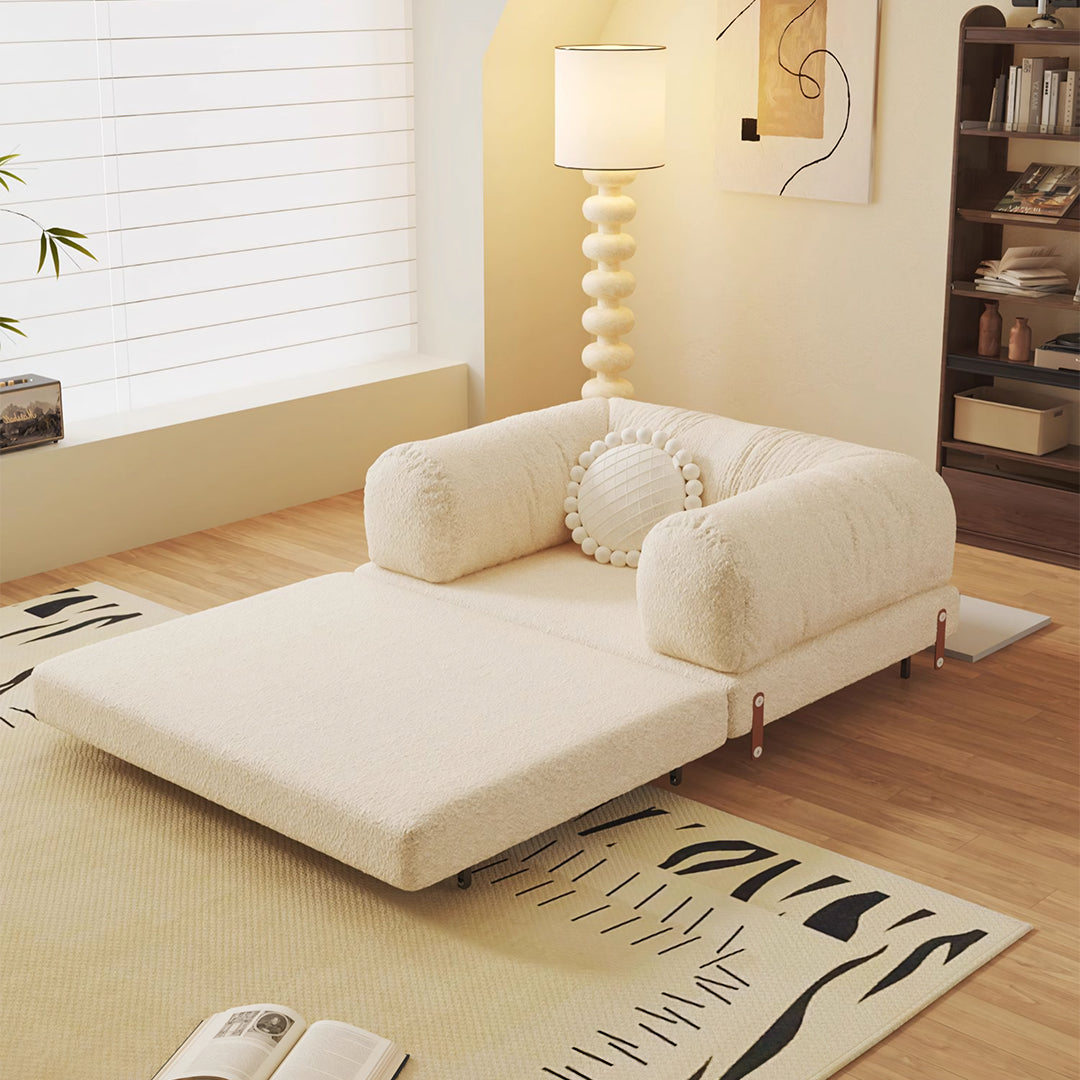 Cream-colored plush choudhury two seater sofa bed with soft corduroy fabric and rounded armrests, backrest washable