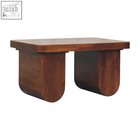 Chunky chestnut coffee table with rich brown wooden top and curved solid wood legs perfect for your living room