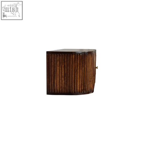 Chunky chestnut wall mounted console chest of drawers with dark brown vertically ribbed mango wood and brass handle