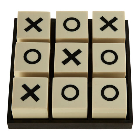 Cream-colored small white and black noughts and crosses game with four x pieces five o pieces in dark wooden tray