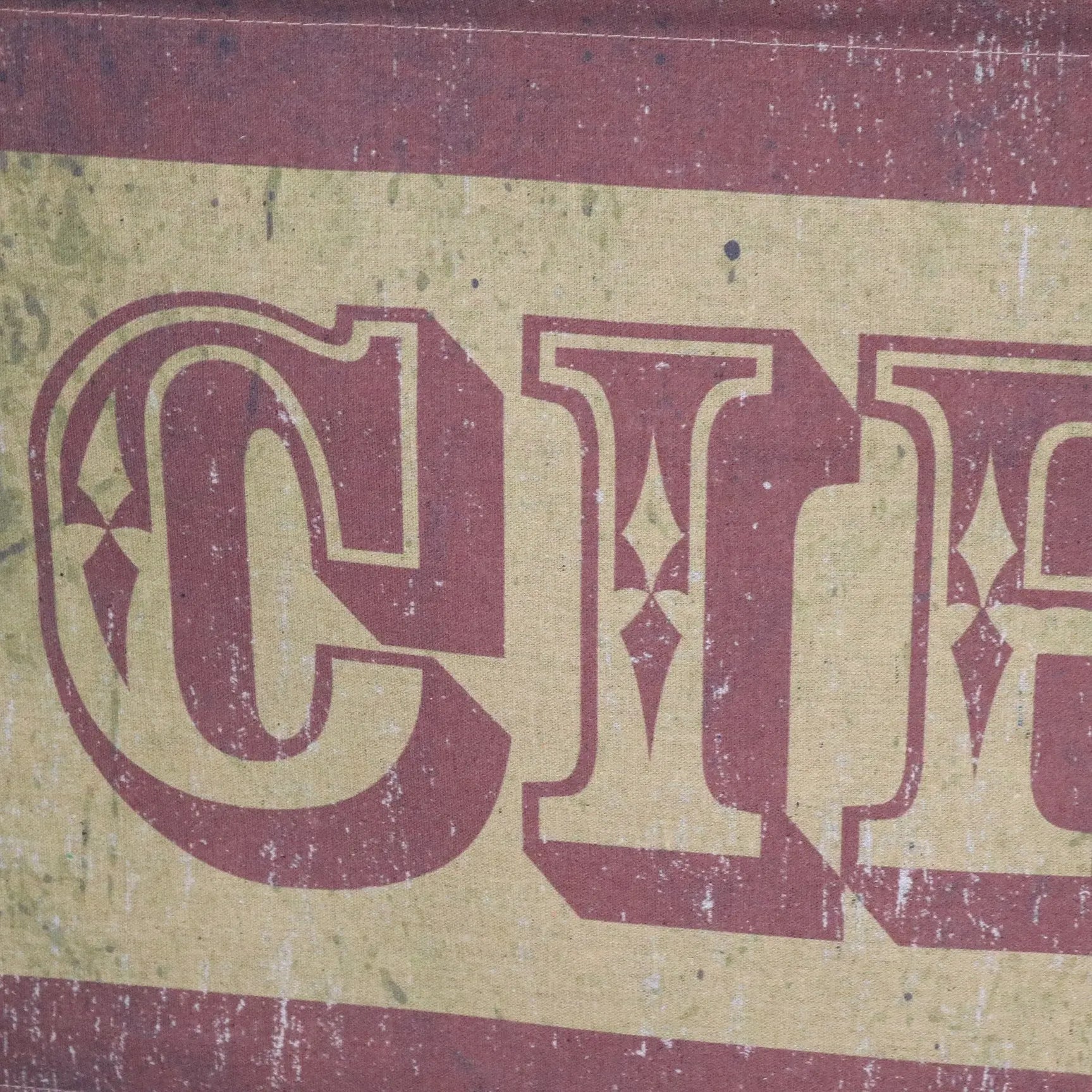 Vintage-style maroon and cream circus sign canvas wall art with distressed stenciled lettering perfect as a circus sign wall art