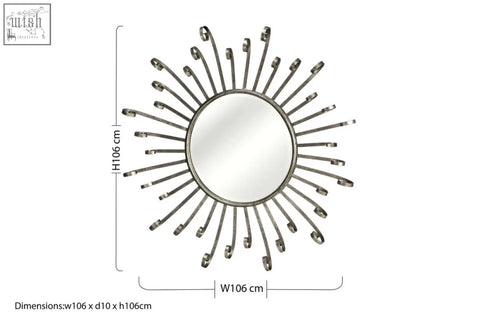 Silver sunburst cissell spoke style wall mirror with circular reflective center and radiating metal arms