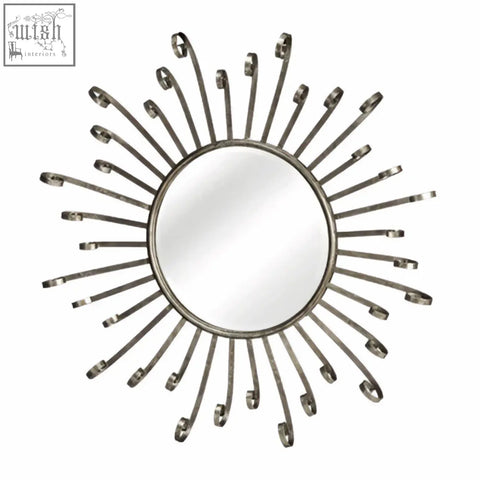 Silver sunburst cissell spoke style wall mirror with slender metal arms and circular reflective center