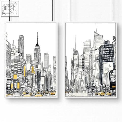 Two framed black and white city prints wall art with yellow accents featuring empire state building sketches