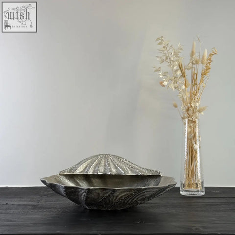 Silver metallic clamshell solid champagne ice bucket with textured ridges and matching lid for wine cooling
