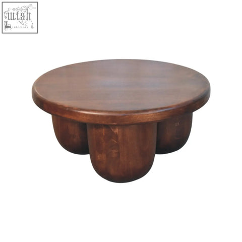 Clara sculpted coffee table in dark brown solid mango wood with smooth finish and four rounded legs