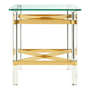 Clarence side table with gold-accented acrylic legs and green glass top perfect for rooms feeling open and airy