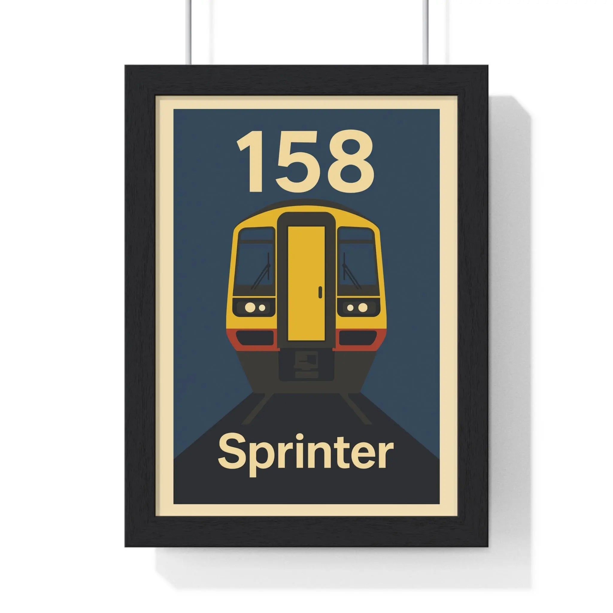 A framed sprinter train poster featuring a yellow and red class 158 regional railways design on a dark blue background