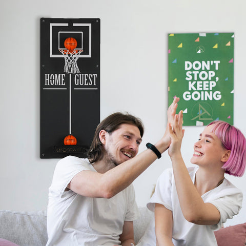 Classic basketball wall game with black wall game frame orange balls and home guest target area for indoor fun
