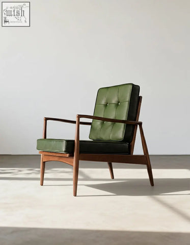 Classic c02 armchair with green leather tufted upholstery and dark wood frame mid-century modern style