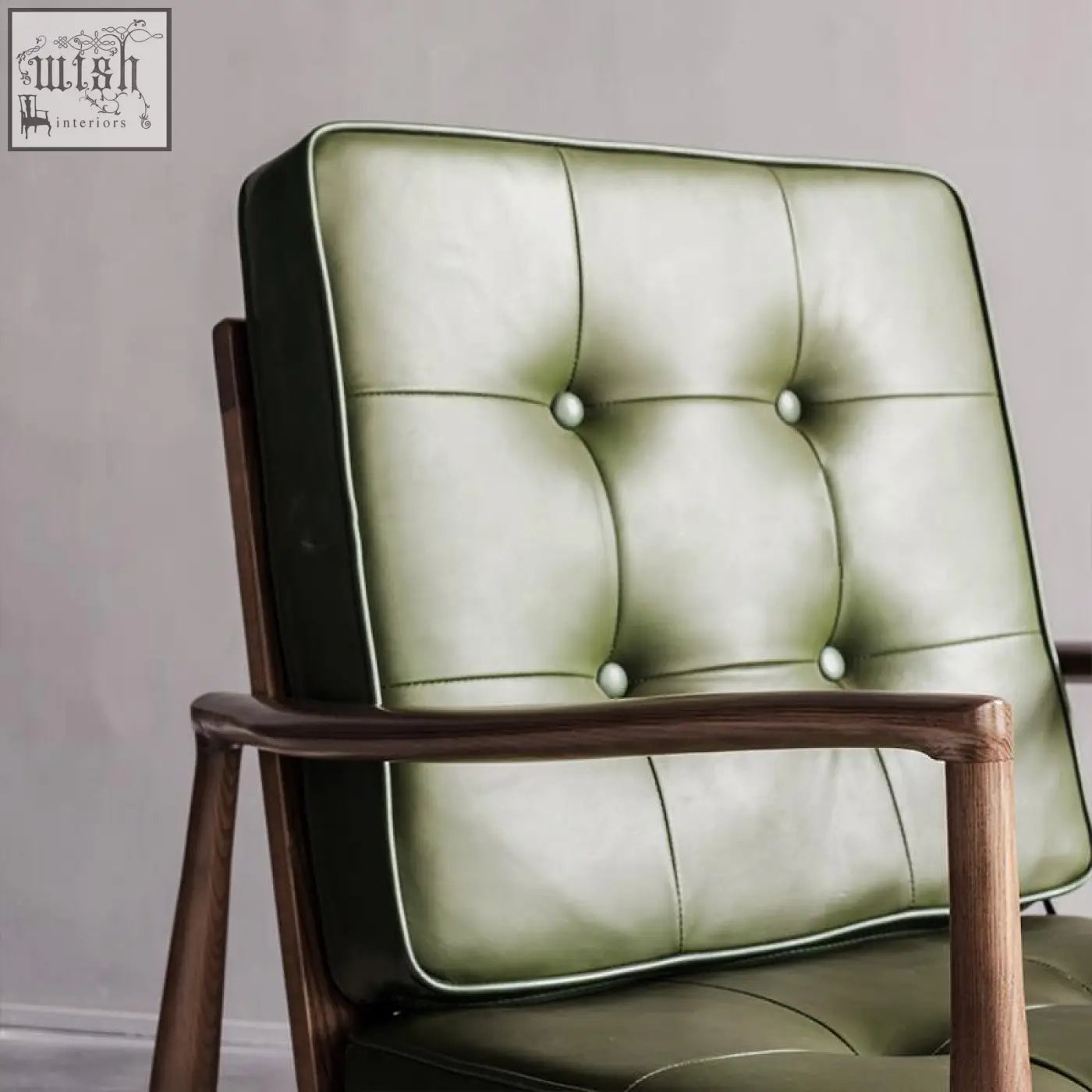 Classic c02 armchair in olive green leather with tufted design and dark wood frame green leather armchair