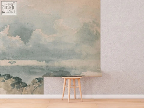 Minimalist wooden stool with slender legs and round seat in light natural wood for living space with traditional paper