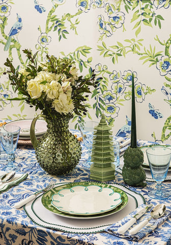 Classic green round placemats set of 4 with a green textured glass pitcher filled with white roses and greenery