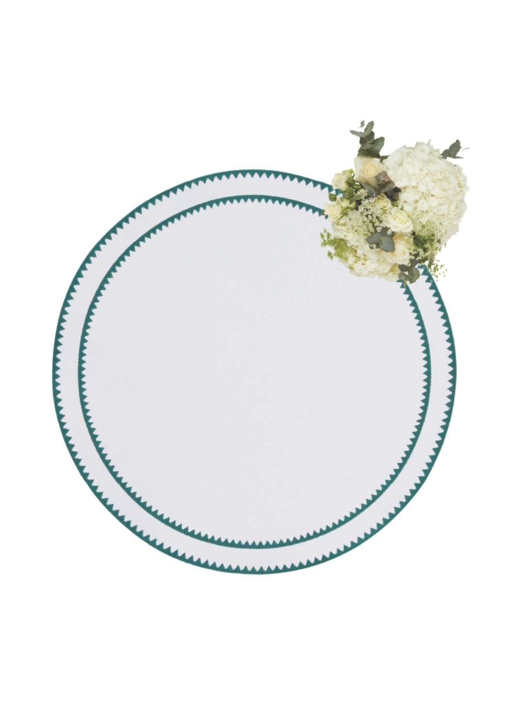 White ceramic plate with a teal zigzagged rim on classic green round placemats set of 4
