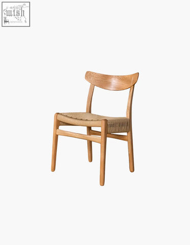 Classic hans w ch01 rattan dining chair in light oak with a woven natural fiber seat and curved backrest