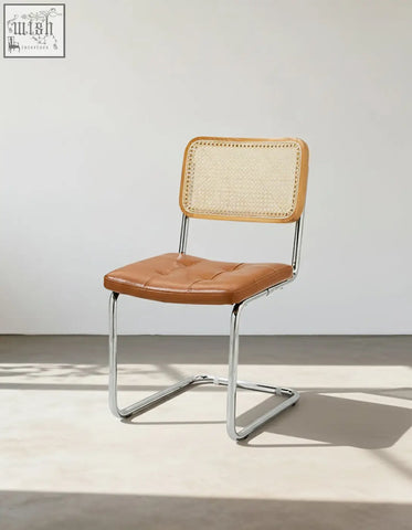 Brown leather tufted classic keaton rattan dining chair with woven cane backrest and chrome cantilever frame armless