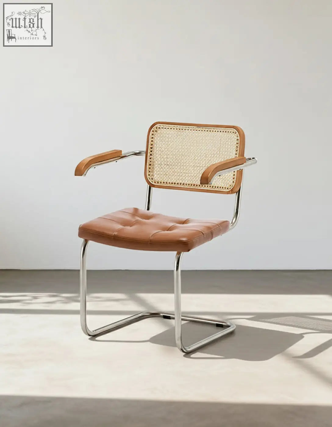 Brown leather tufted classic keaton rattan dining chair with woven cane back and chrome cantilever frame with armrests