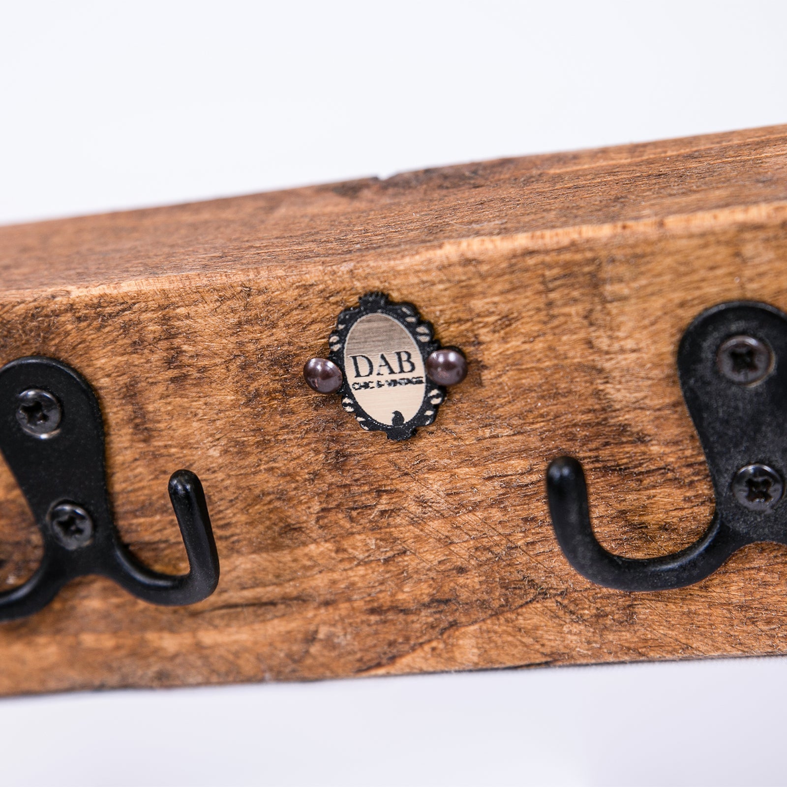 Rustic chic coat hanger classic key bum with wooden base black metal hooks and decorative dab off-vine plaque