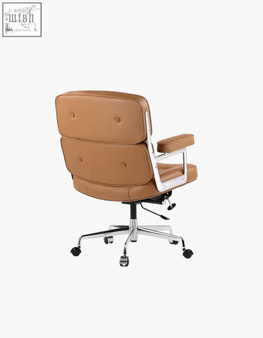 Tan brown leather executive office chair with chrome base and armrests perfect for a stylish workspace