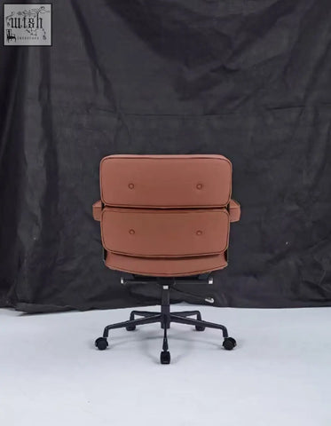 Tan brown leather executive office chair with sleek modern design and black metal base perfect for desks