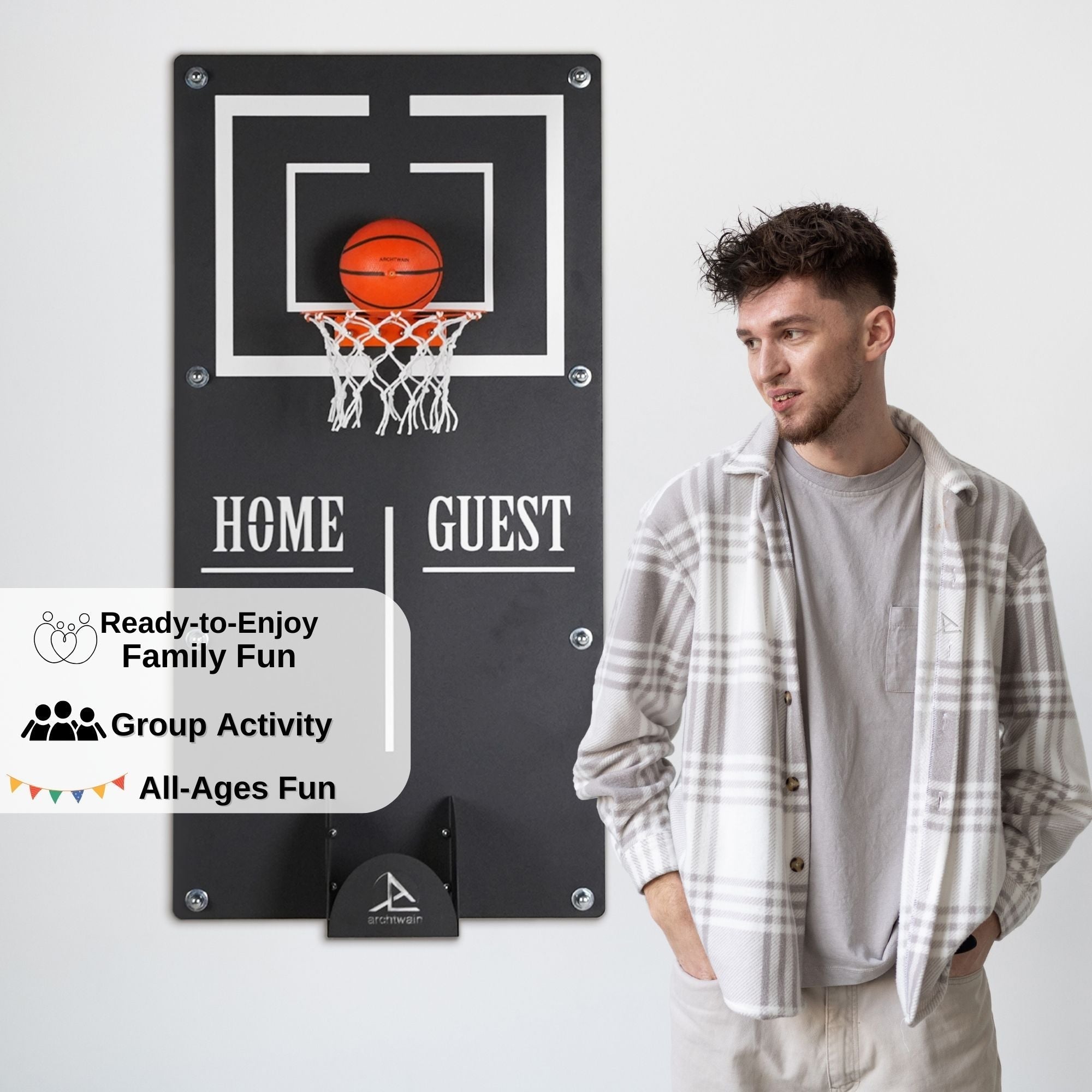 Black wall-mounted basketball wall game with white rim, net, target area, and ball holder for home and guest scoring