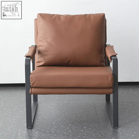 Brown leather classic tr58 armchair with sleek black metal frame for stylish and comfortable seating