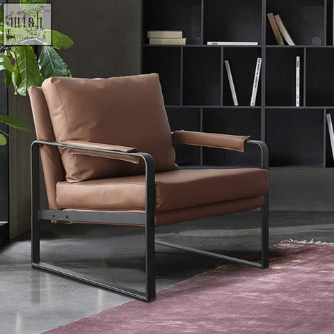 Brown leather classic TR58 armchair with sleek black metal frame perfect for stylish living spaces