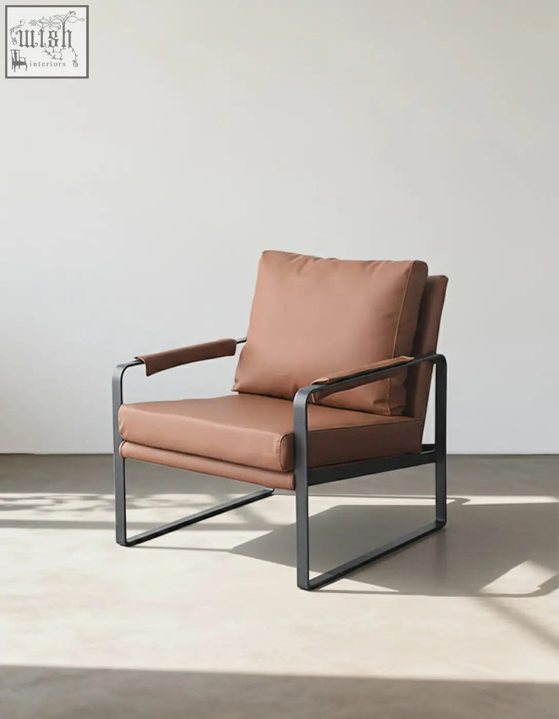 Classic tr58 armchair with brown leather seat and sleek black metal frame for stylish comfortable seating
