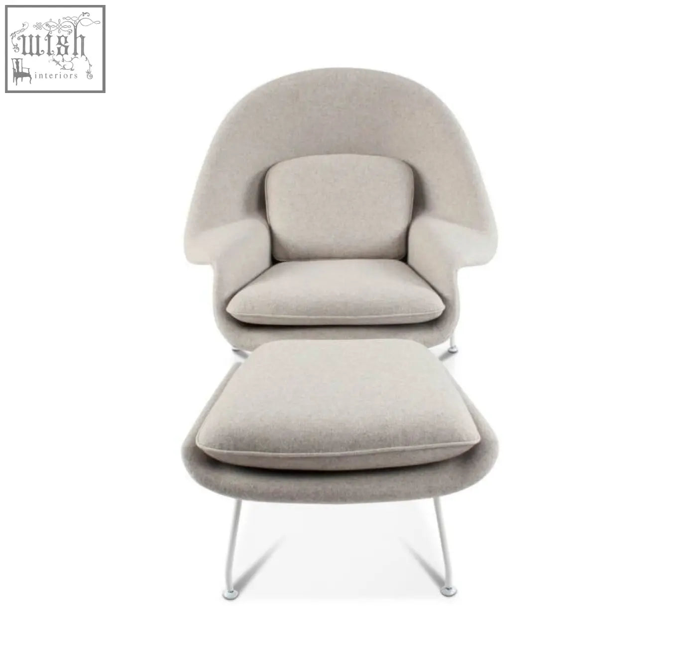 Beige classic womb chair and ottoman with sleek curved design and slender metal legs in premium velvet or linen