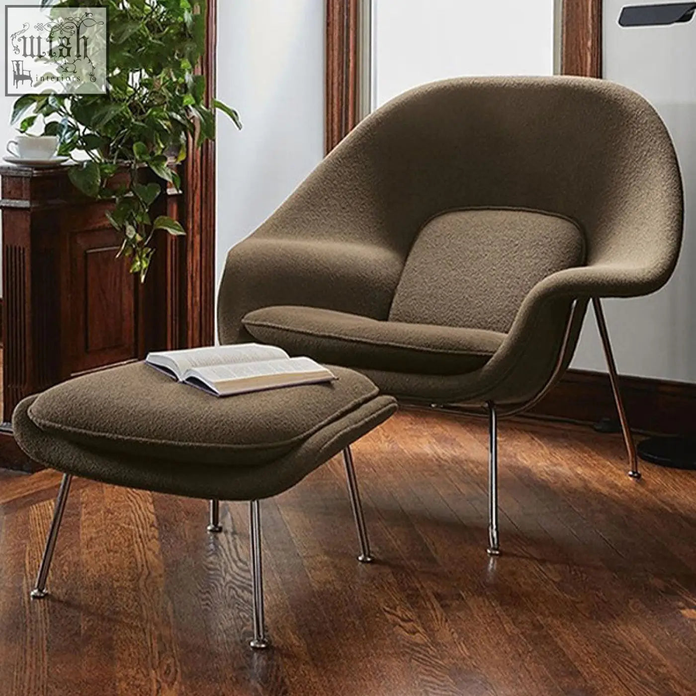 Brown upholstered classic womb chair with matching ottoman in velvet featuring sleek chrome legs and rounded design
