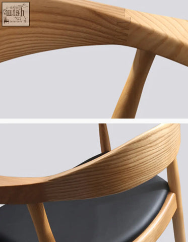 Light-colored wooden classical kennedy dining chair with sleek curved backrest black upholstered seat dark oak