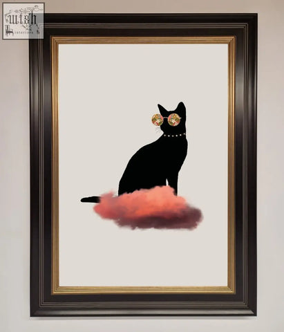 Cloud cat framed poster features a black cat silhouette with gold sunglasses and pearls sitting on a pink cloud in a dark wood frame