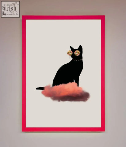 A cloud cat framed poster featuring a black cat silhouette with gold sunglasses and beaded collar on a pink cloud