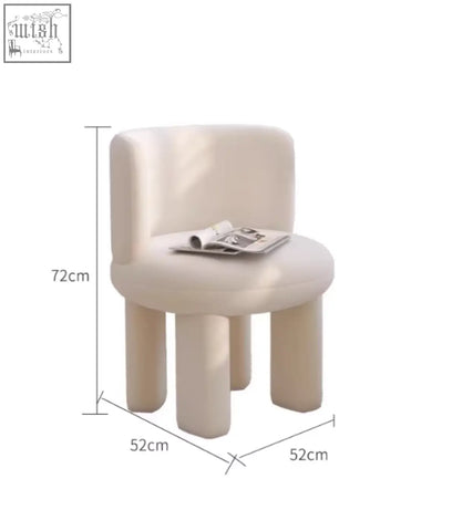 Cream-colored upholstered cloud dressing stool with rounded minimalist design and thick cylindrical legs