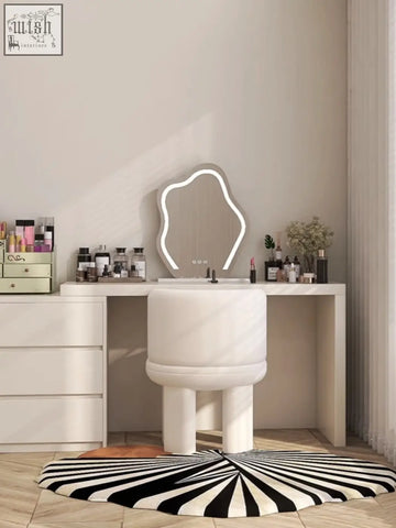 White modern vanity mirror with glowing led light frame and cloud dressing stool with organic shape