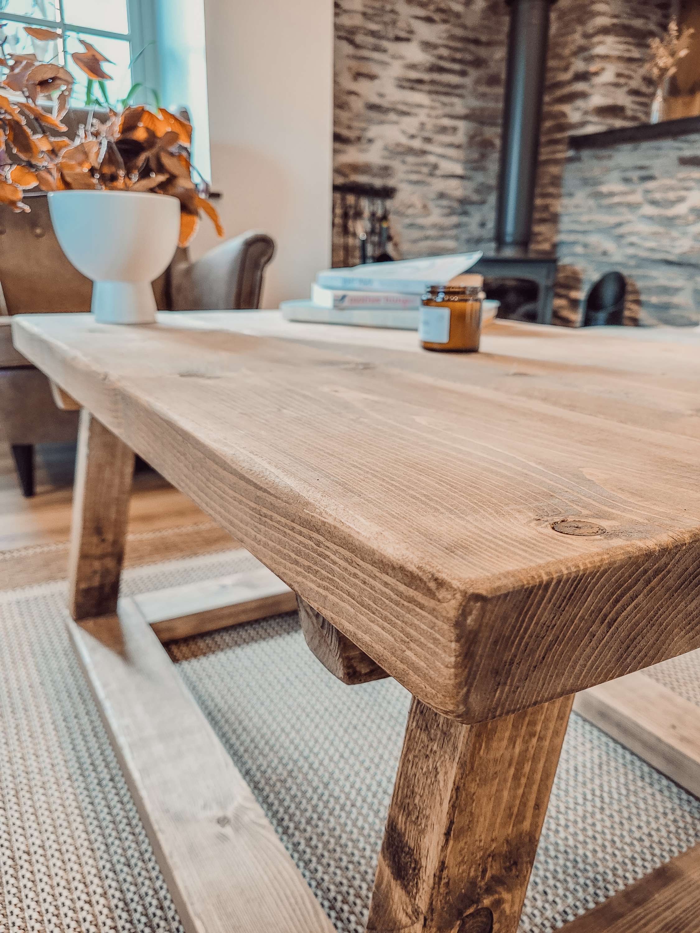 Rustic light brown wooden coffee table with visible grain and sturdy legs from coav rustic pictured table