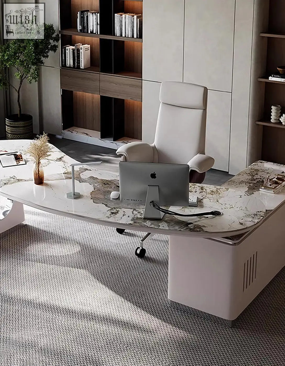 Modern white leather executive chair with high back and adjustable armrests next to coelho corner office desk with sintered stone