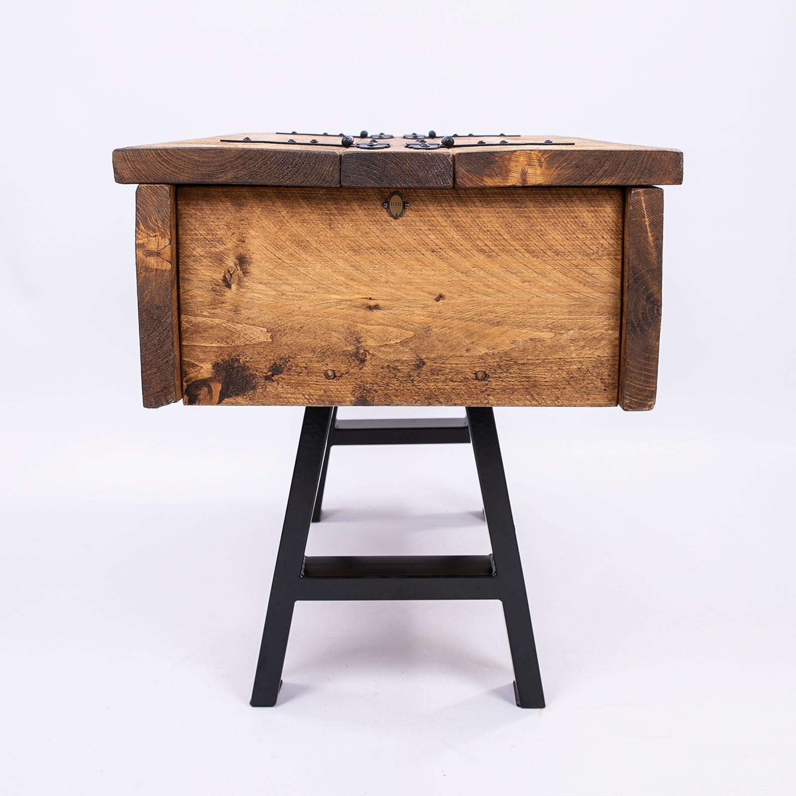Rustic wooden blanket box with dark brown top and lighter wood sides on black metal legs free uk delivery available