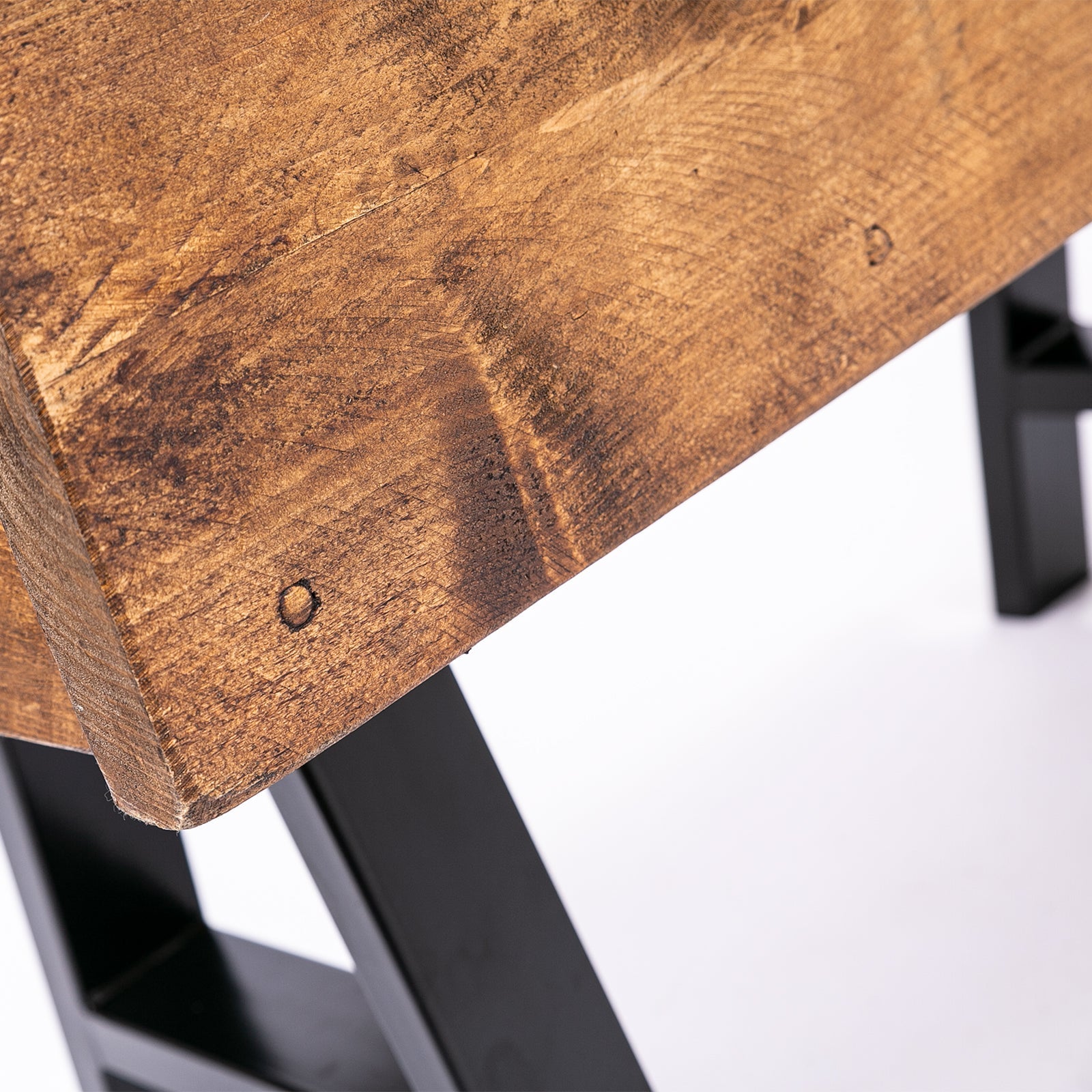 Rustic brown wooden tabletop with visible grain and nail head detail on a wooden blanket box with free uk delivery