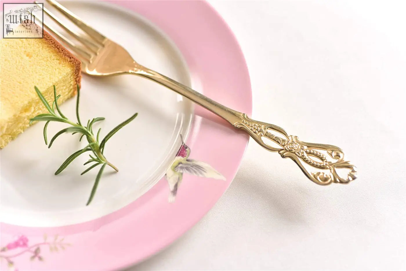 Gold fork with ornate filigree handle paired with shabby chic porcelain dessert plate set in pink gift box