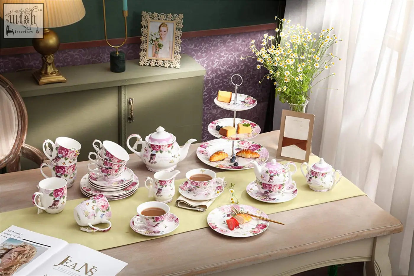 A delicate porcelain coffee tea cup and saucer set with pink bird rose floral pattern in a gift box
