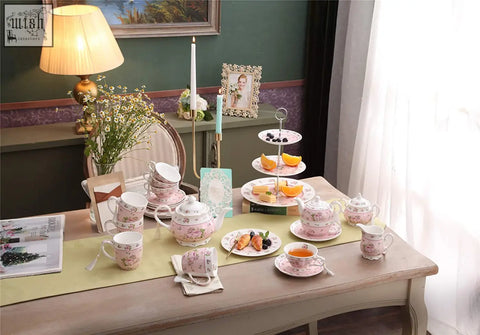 Pink floral porcelain tea set with matching cups saucers teapot and creamer on wooden table in rose pink 2pc gift box