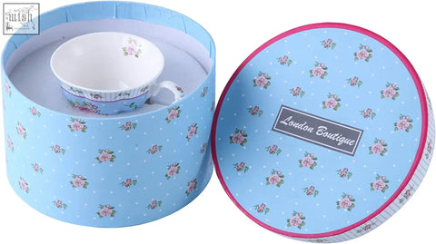 A delicate white porcelain teacup with rose lavender floral pattern in a light blue gift box 1pc set