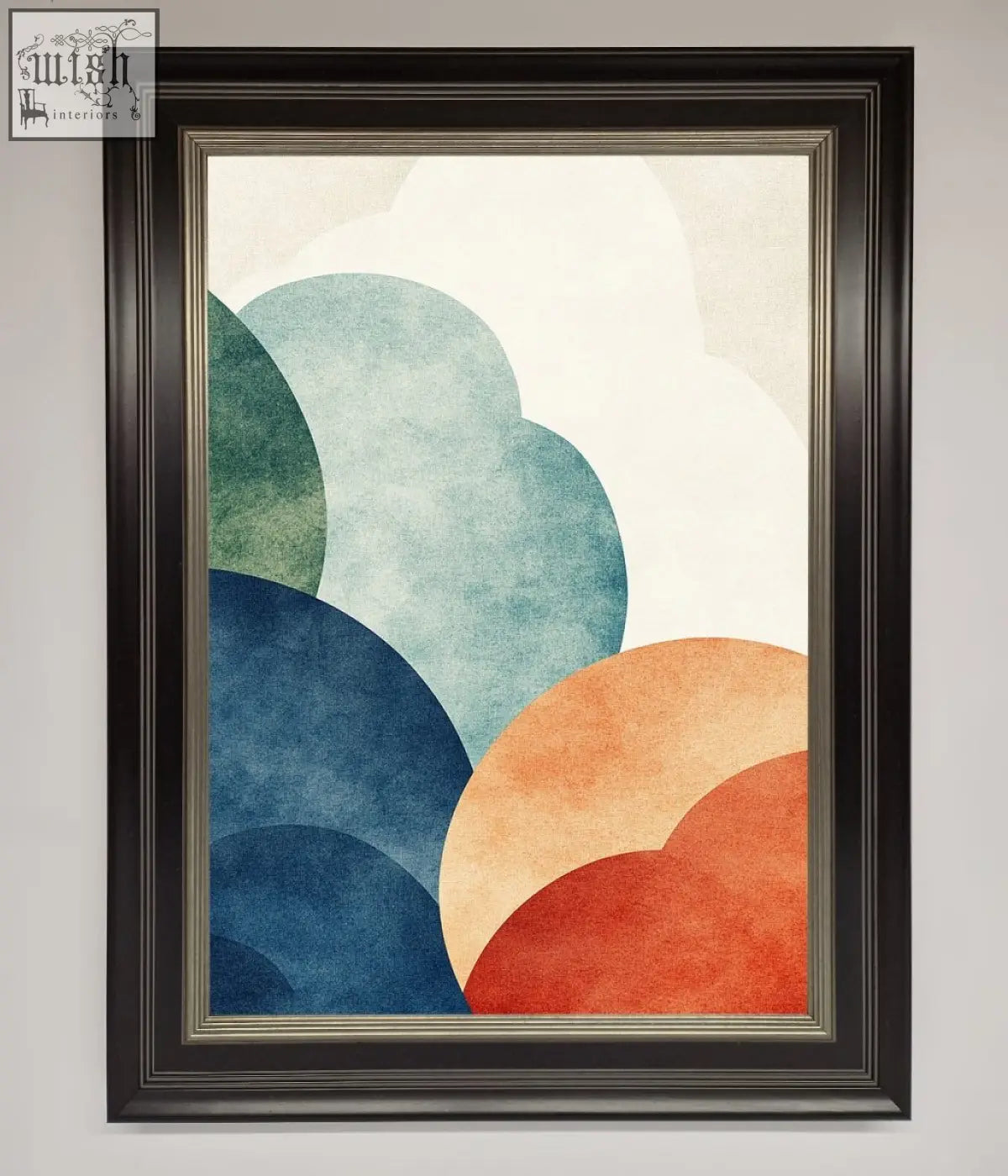 A modern colour clouds framed wall art with overlapping teal, blue, orange, and red circles in a dark brown frame with silver border