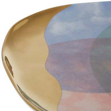 Golden smooth-edged paradise dinner plate with painted pastel blue sky and purple earth tones interior design