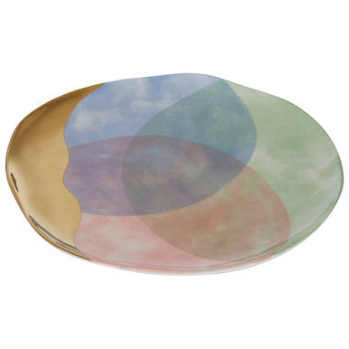Pastel-colored ceramic paradise dinner plate with abstract overlapping circular patterns in soft blues pinks and greens
