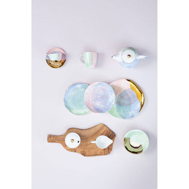 Pastel-hued ceramic paradise dinner plate with iridescent glaze and gold-trimmed edges from choose orsina