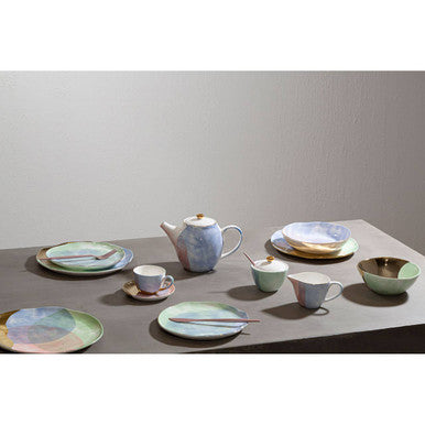 Pastel-toned ceramic paradise dinner plate with soft gradient glazes and subtle texture for stylish paradise dinner use