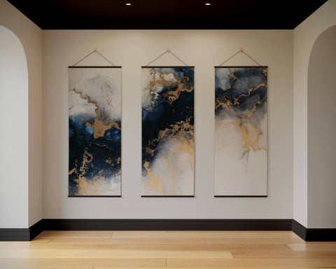 Three vertical colourful marble tapestry panels with swirling navy blue white and gold marbled patterns on wall