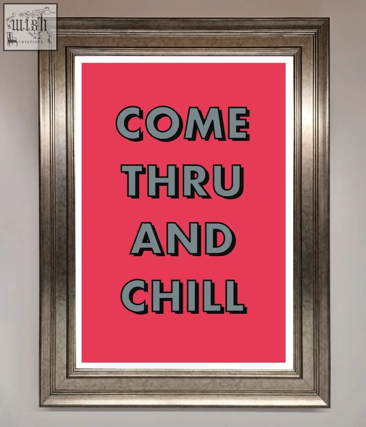 A chill framed poster with bold gray text on a vibrant pink background in an ornate silver toned frame option